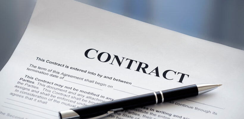 Pen on the contract papers Pen on the contract papers